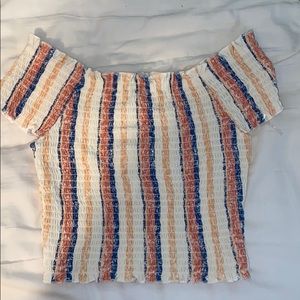 Off the shoulder, tight fitting crop top!